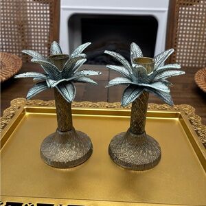 Two vintage brass palm tree candle stick holders
